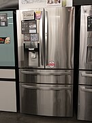 Refrigerators with exterior ice and/or water dispenser