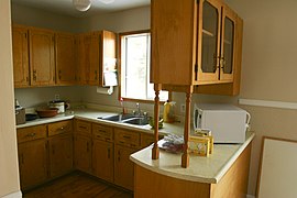 Open floor plans, with kitchen peninsulas