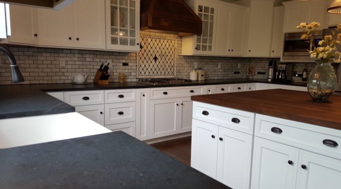 Black Soapstone counters with white cabinets in st louis