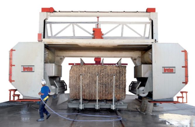 Block of granite being cut into slabs on a Breton diamond wire saw