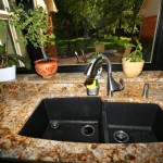 Black Silgranite sink with Geriba Beach granite