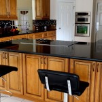 Black Galaxy granite with Honey glazed cabinets