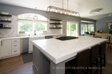 Calcatta Verona Quartz with Grey & White Cabinetry in the st. louis area