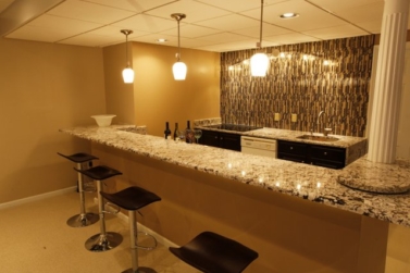 Bianco Antico Granite installed in wildwood basement bar