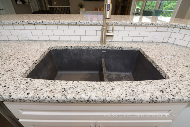 Black speckled white granite with contrasting Blanco Silgranit Anthracite (Black) kitchen sink in missouri