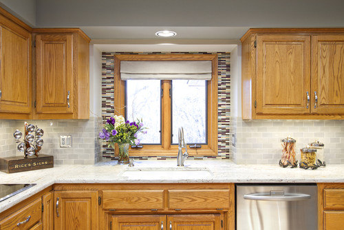 White counters with oak cabinets